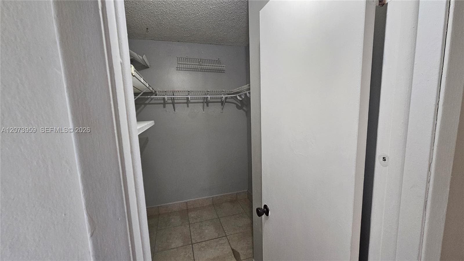 Primary bedroom walking closet