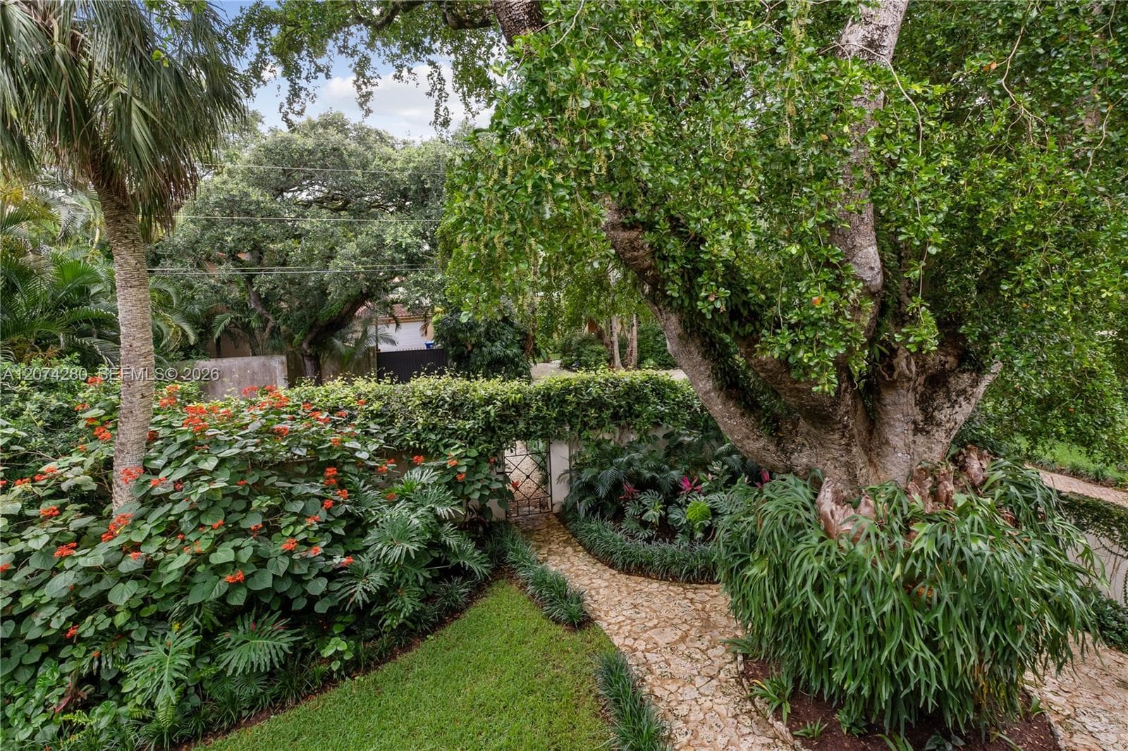 View from Priamry Bedroom's Balcony of the Gated enclosed Front Yard Garden