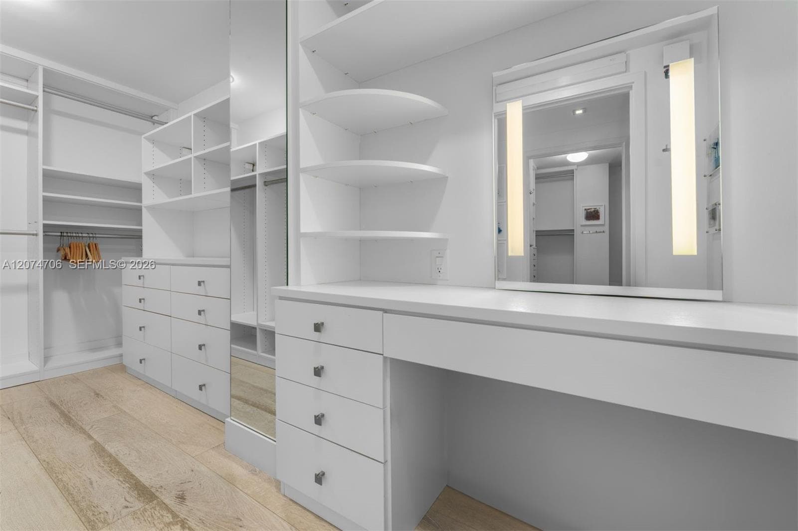 Primary Closet with vanity