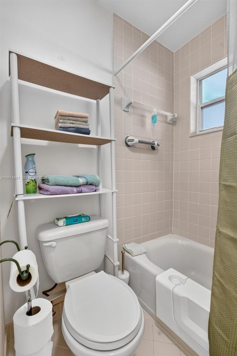 Tub with walk-in assist installed