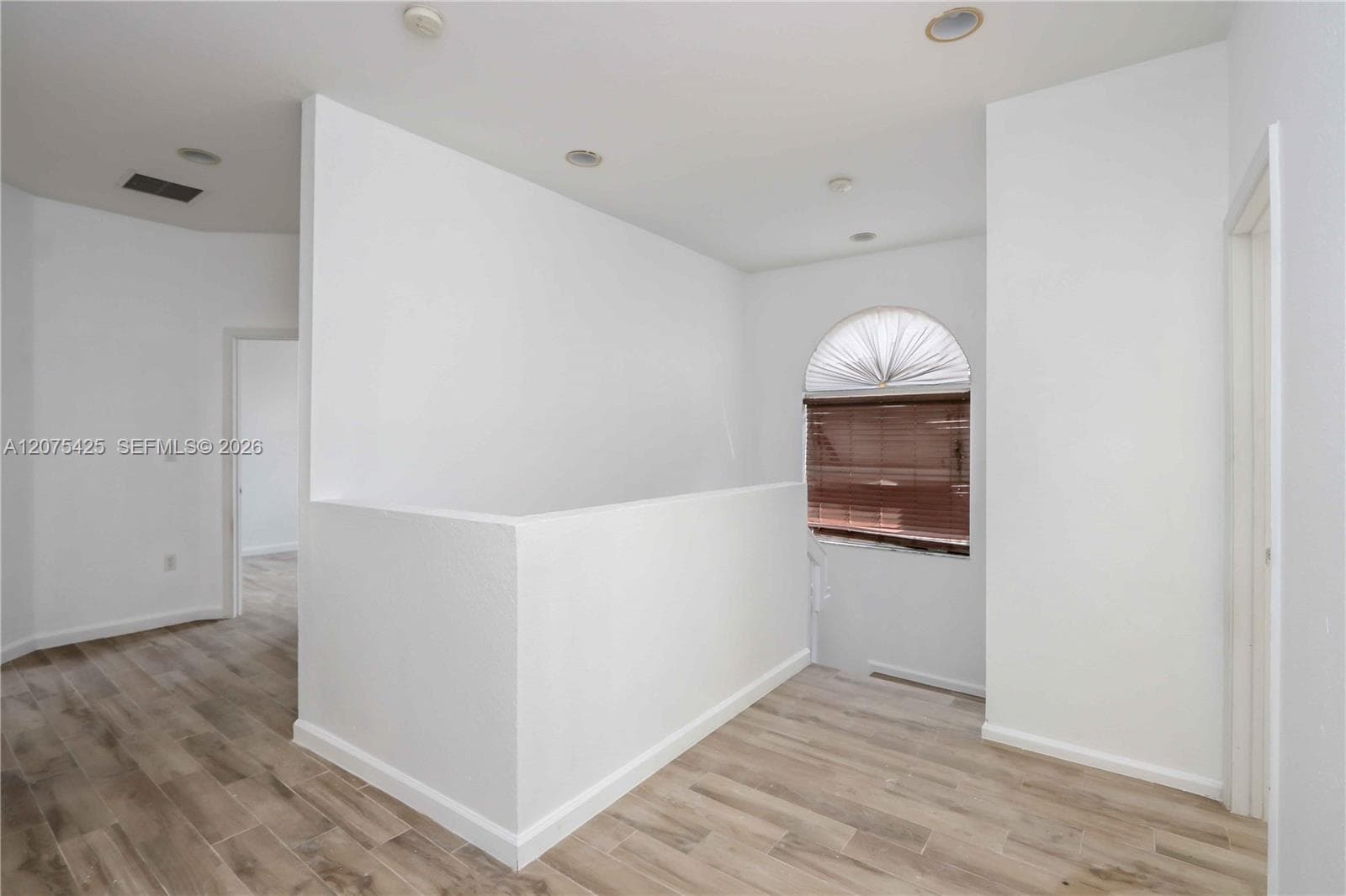Primary bathroom interior with dual vanity.