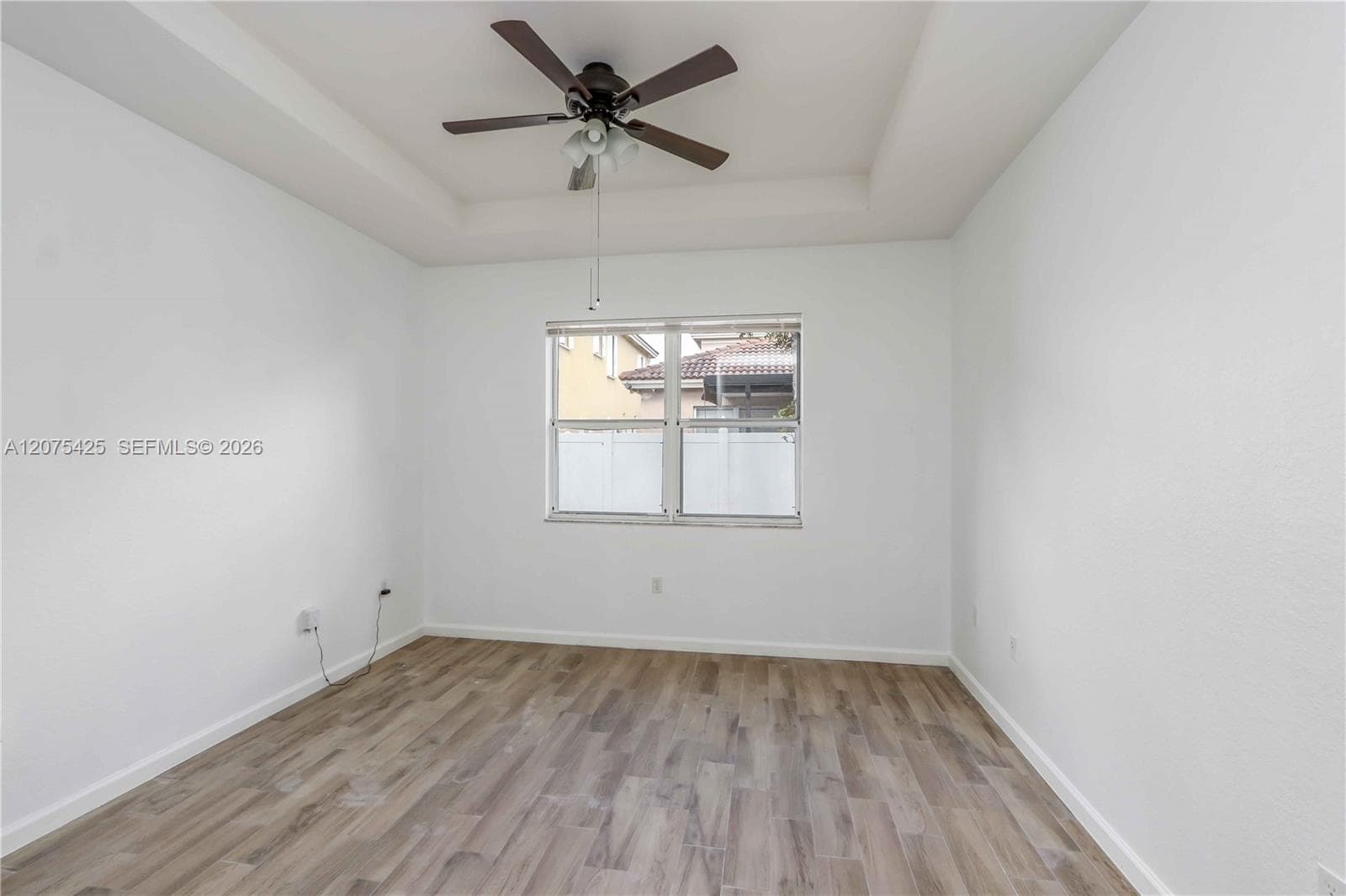 Open-concept living and dining area view.