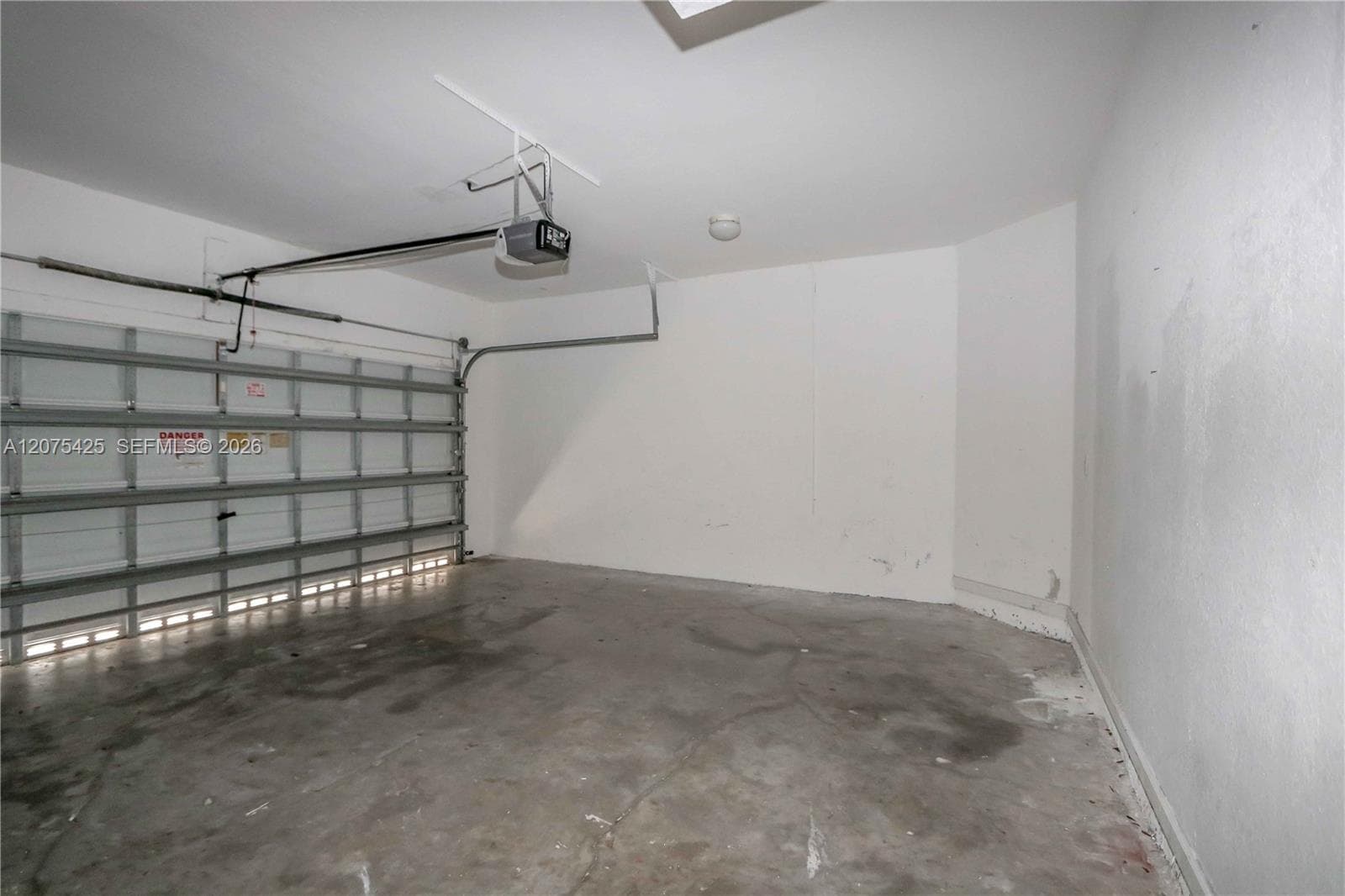 Clean and organized two-car garage interior.