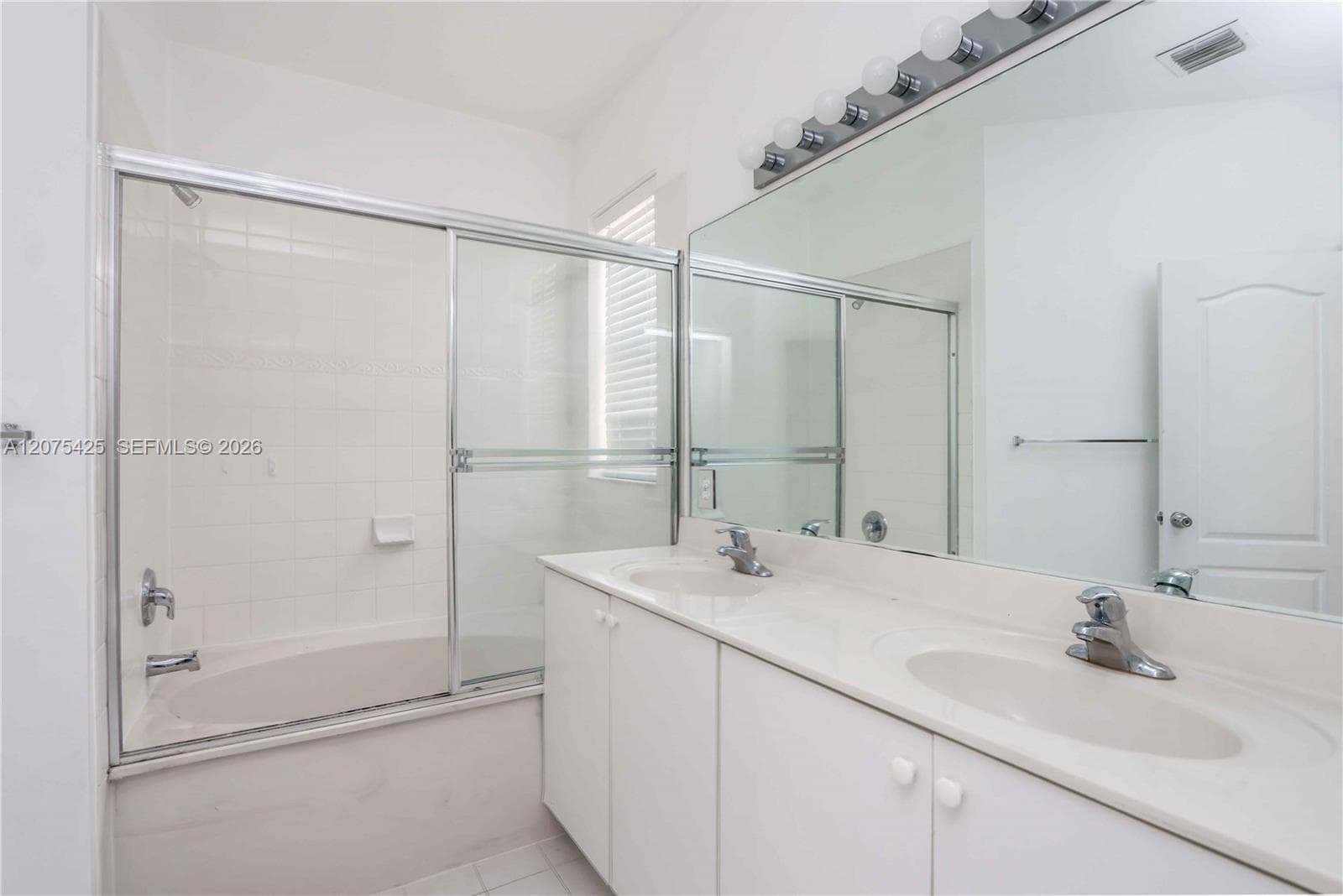 Modern secondary bathroom interior with clean finishes.