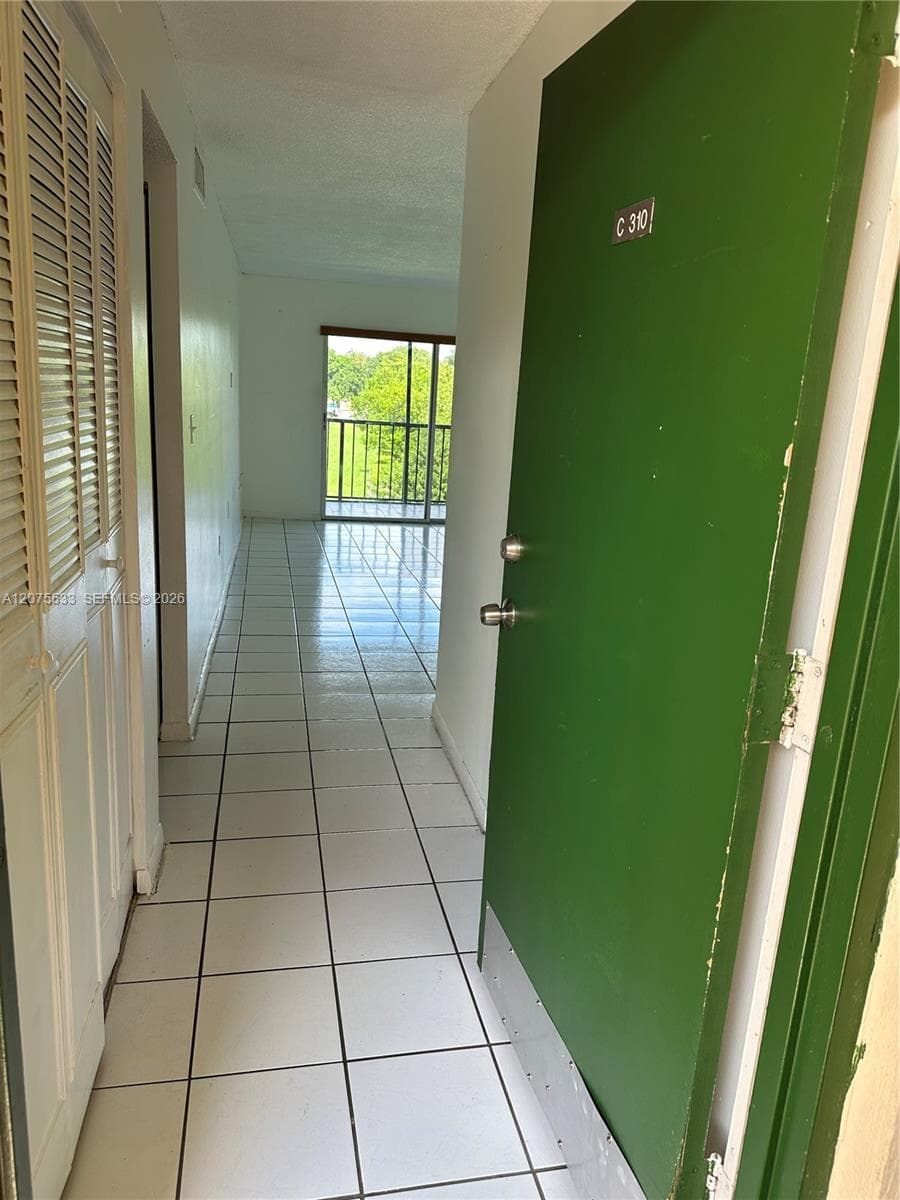 door with view of balcony