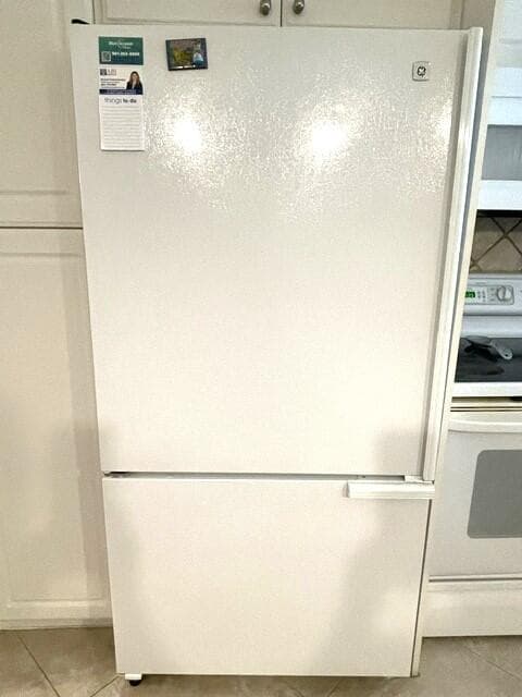 Bottom loading refrigerator
