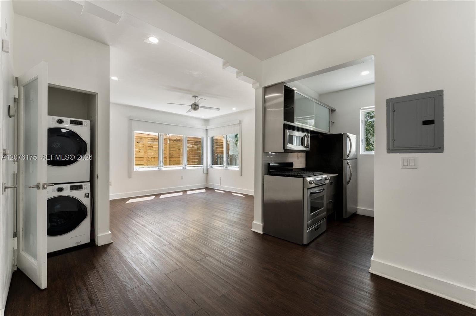 Kitchen, Living Room, and Stacked Washer/Dryer