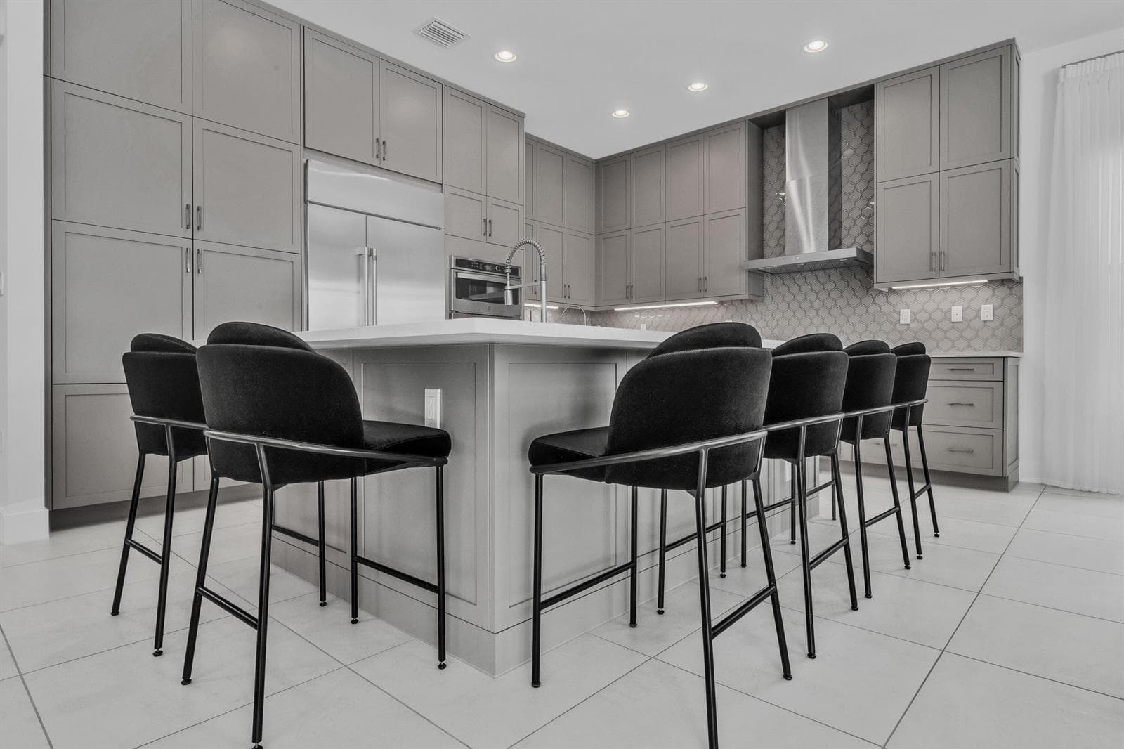 Kitchen — cabinetry to ceiling