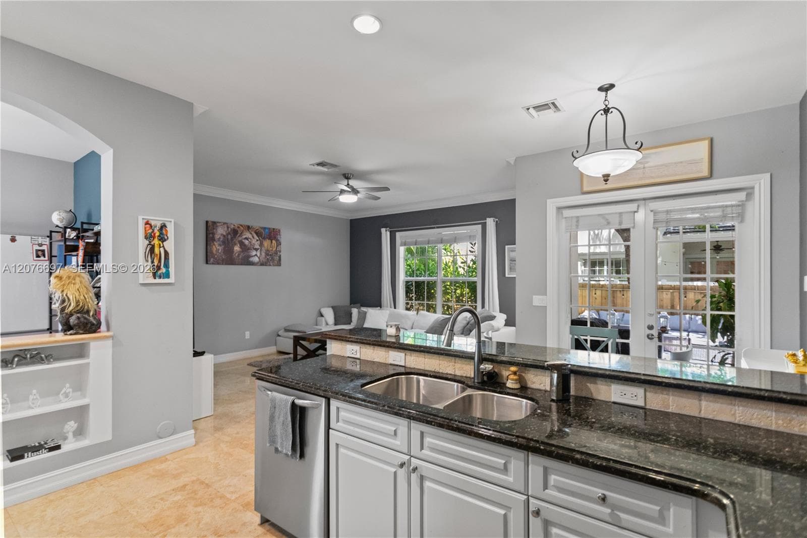 Open Kitchen to Great room with breakfast bar and dining area.