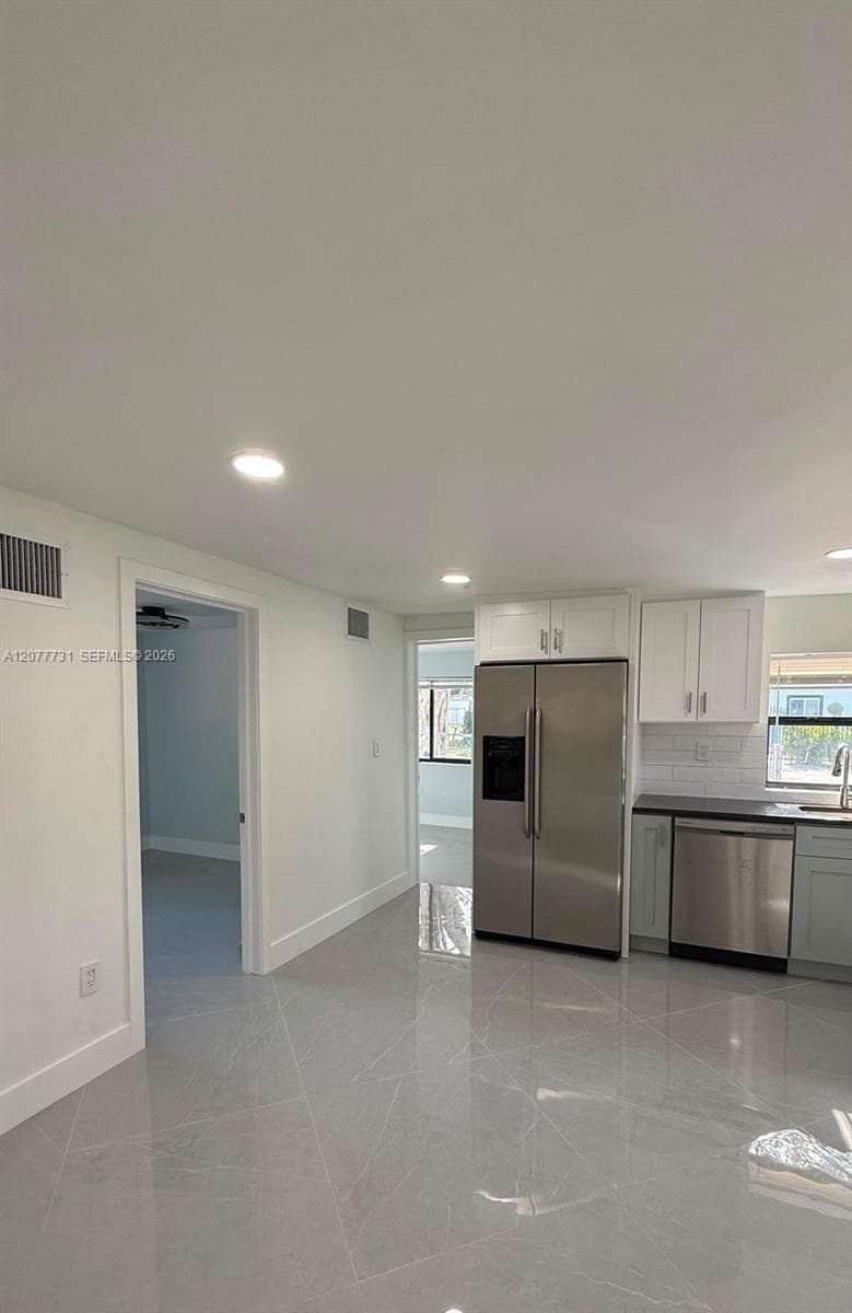 305 NE 58th Ter #0 photo 9