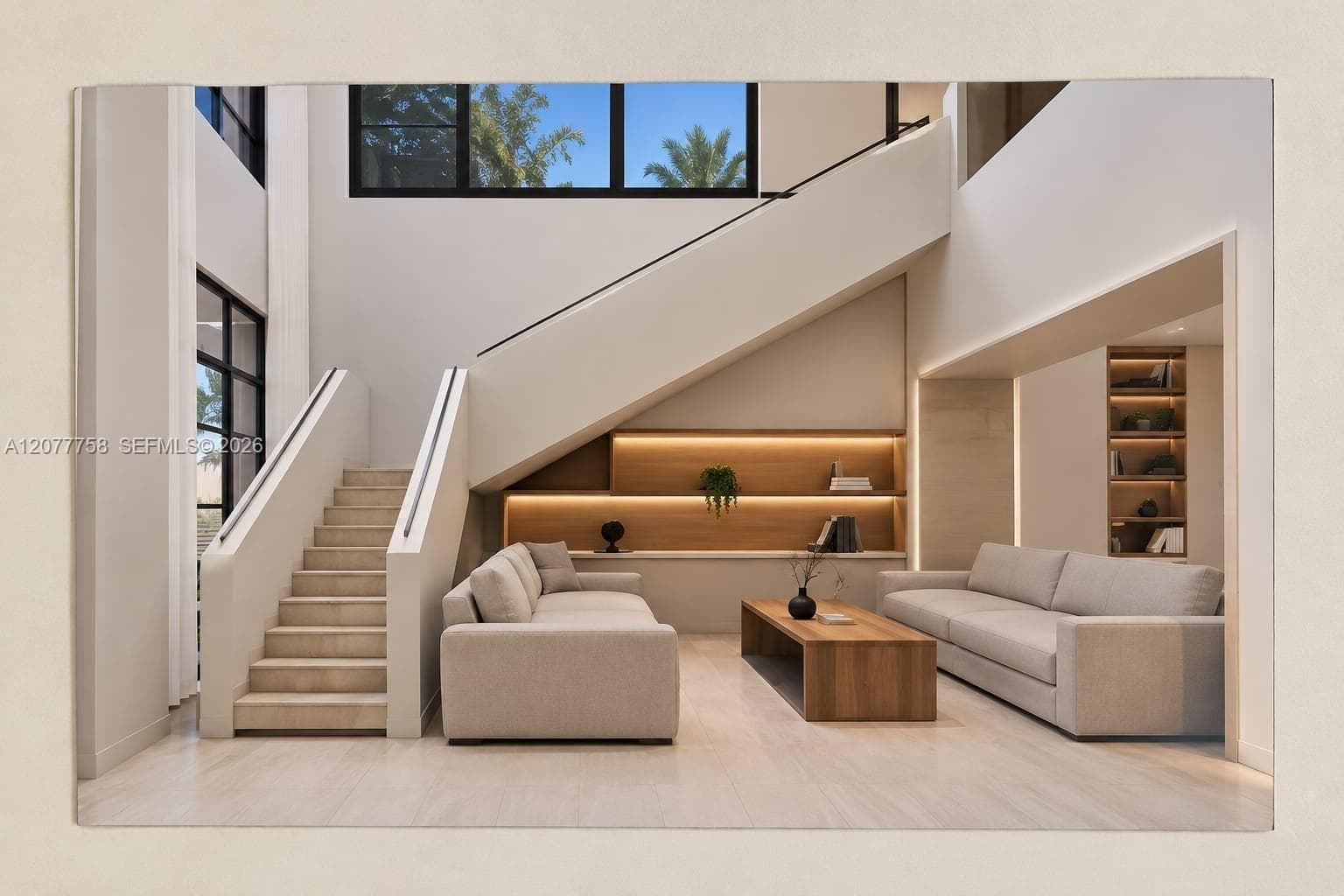 Two-story open concept living area featuring a grand staircase, built-in shelving with integrated lighting, and expansive windows
