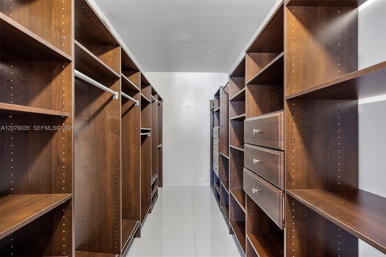 Custom closet in primary bedroom