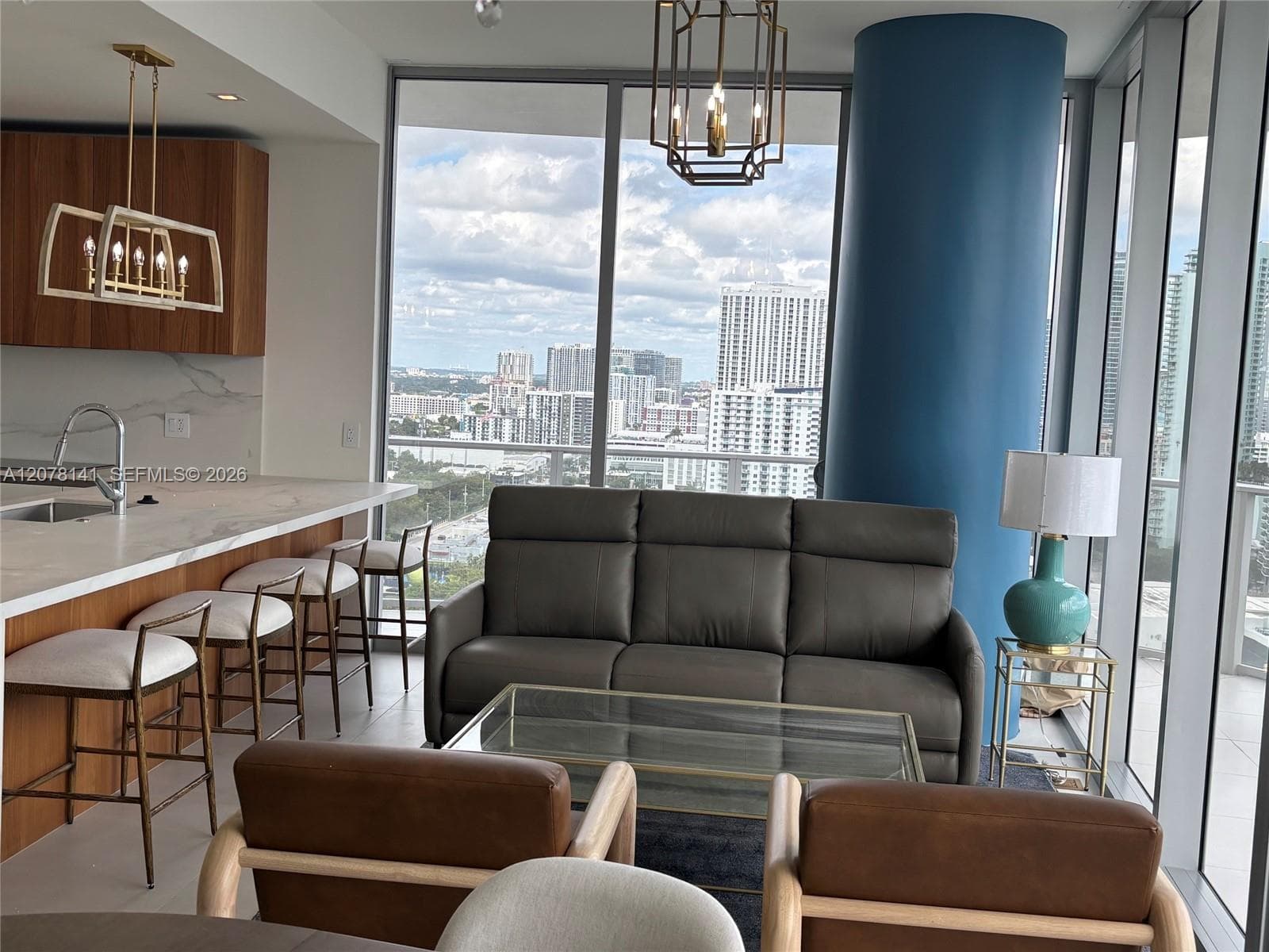 Furnished Living Room with Floor-to-Ceiling Windows