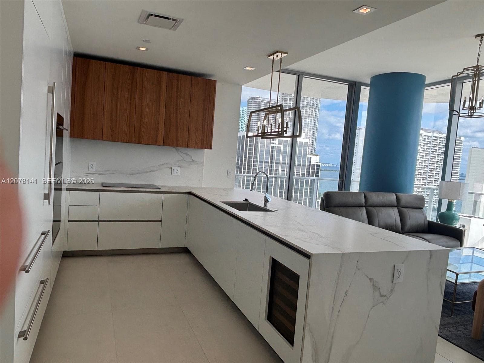 Italian-Style Kitchen with Waterfall Island