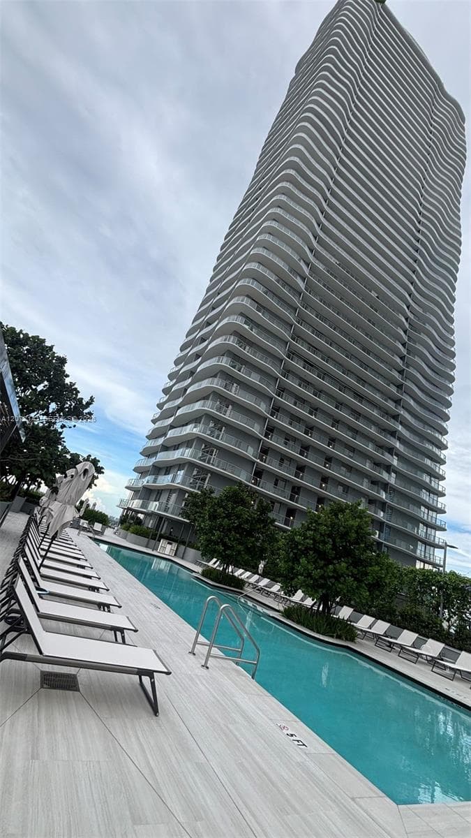 asa Bella Residences by B&B Italia – iconic tower and resort-style pool deck