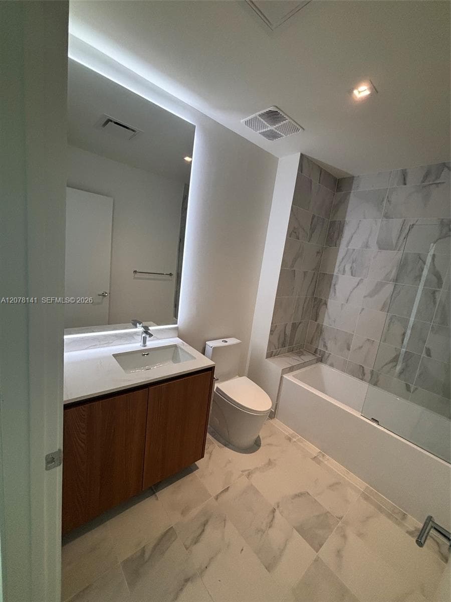 Guess Bathroom with new mirror