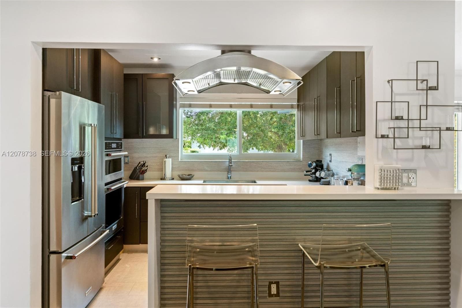 It’s contemporary, functional and designed so the person cooking never feels removed from everything happening around them.