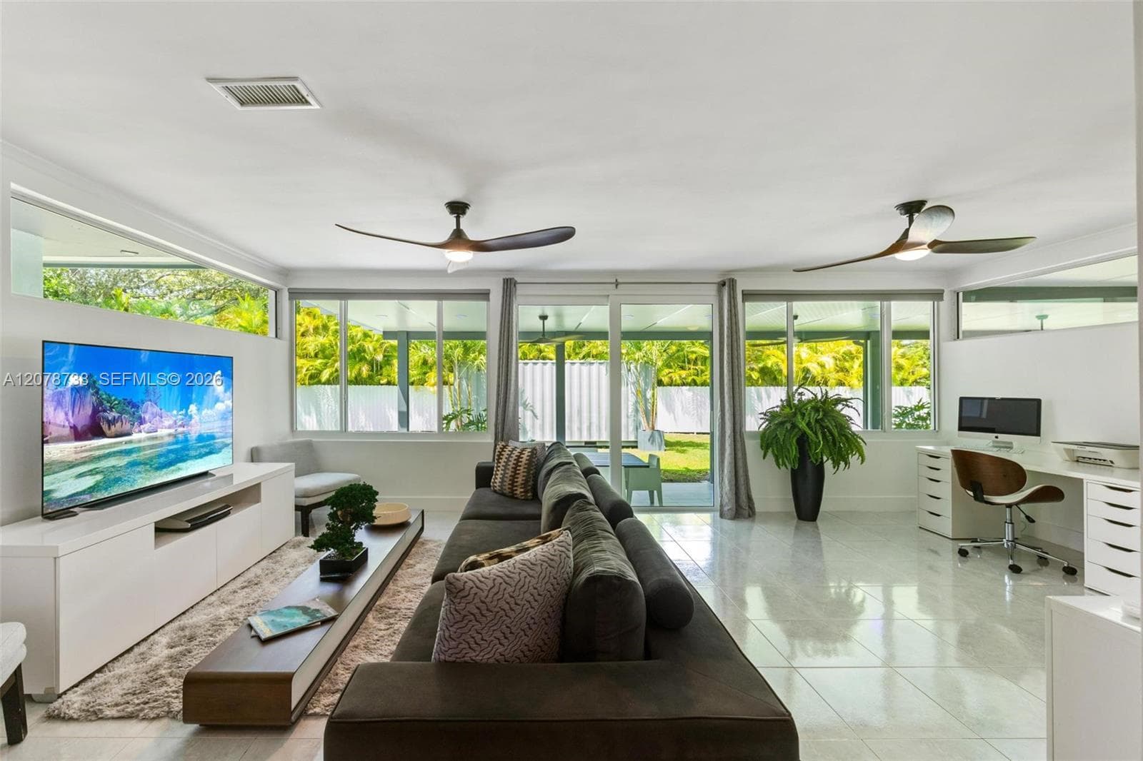 The home’s open layout creates visual connection between its living spaces while still giving each area its own purpose.