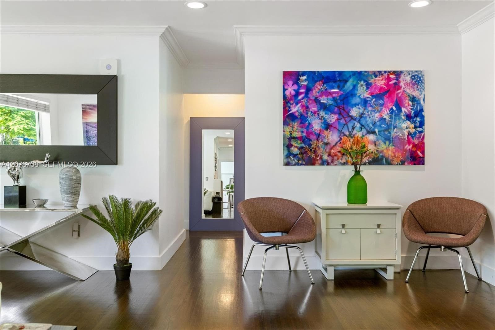 The living and dining spaces flow together instead of feeling separated, giving the home an openness that works just as beautifully for a quiet morning as it does for a house full of friends.