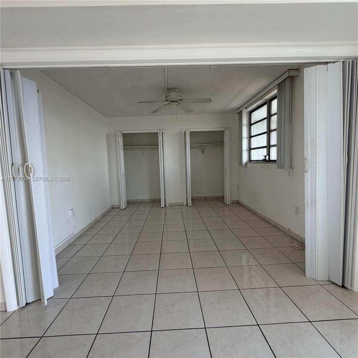 DINING-LIVING ROOM TO BALCONY