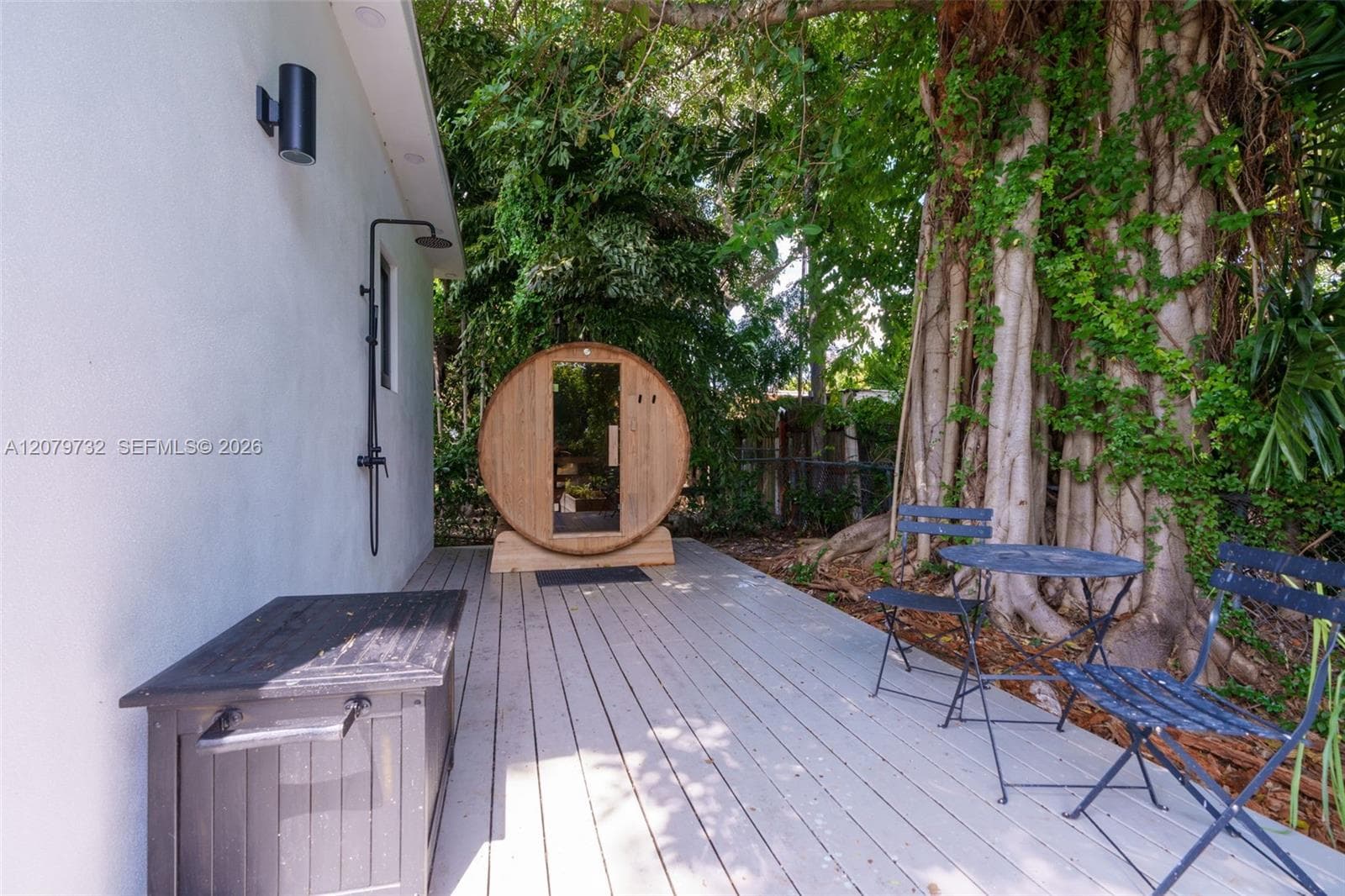 Sauna & outdoor shower on backyard deck by guest house