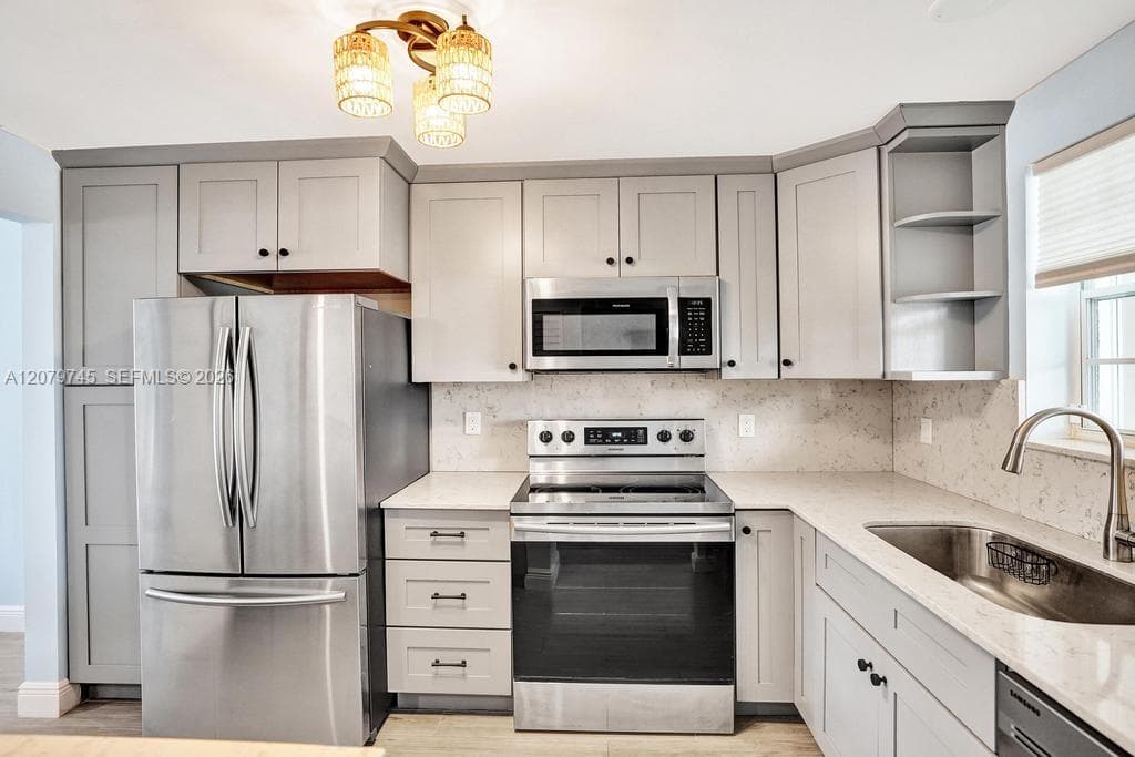 Updated modern kitchen with SS appliances.