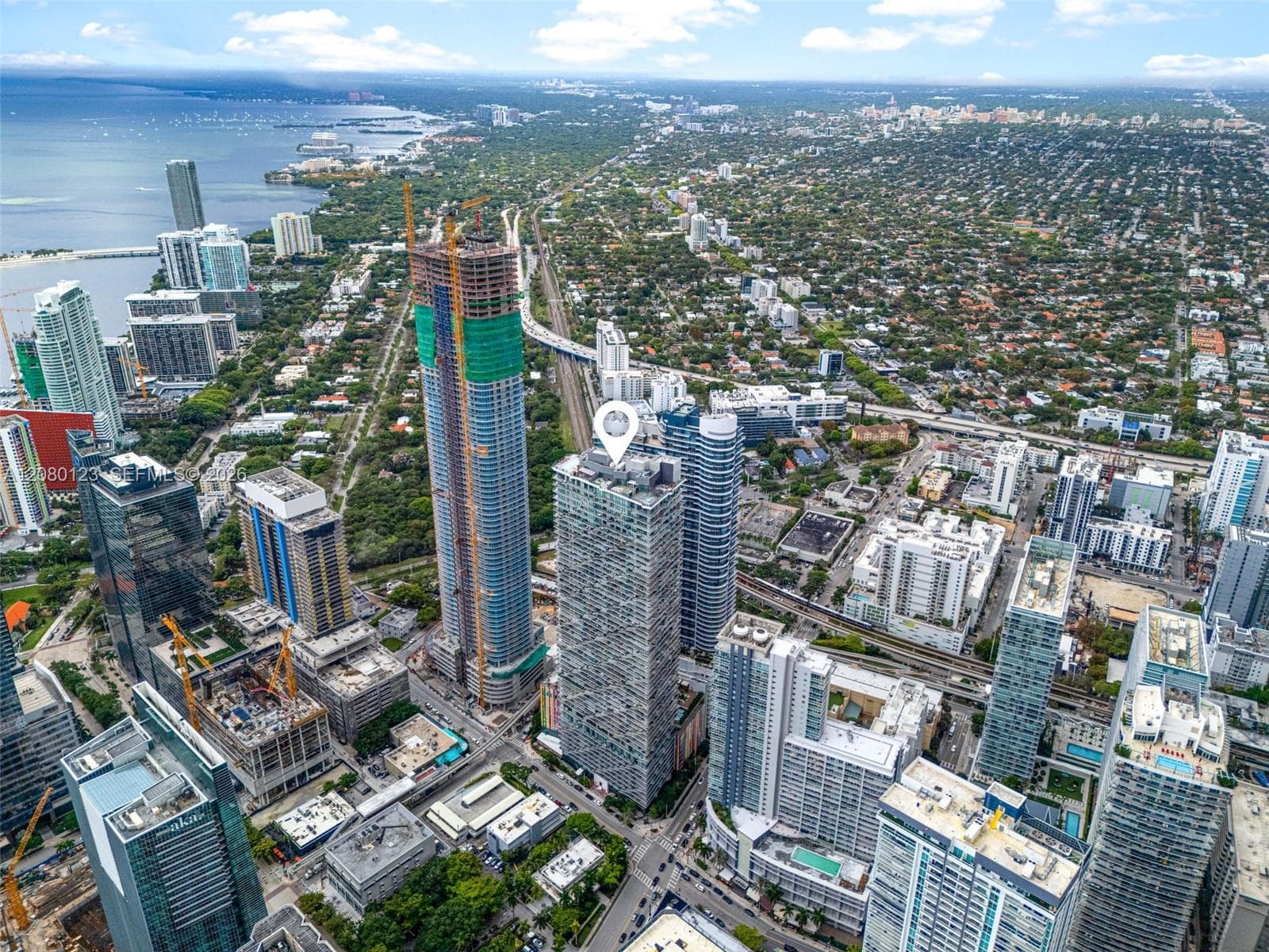 Aerial view of Miami's skyline including Brickell, downtown, and the Port of Miami.