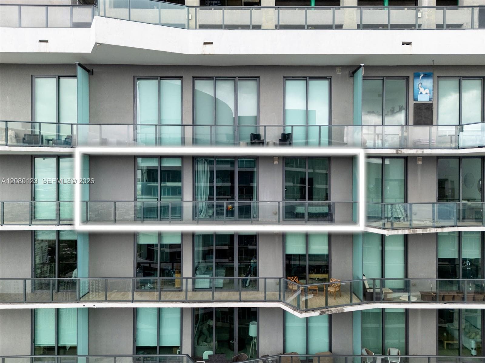 Architectural detail of SLS Brickell Dua's signature glass-and-balcony facade rising 52 stories above Brickell.