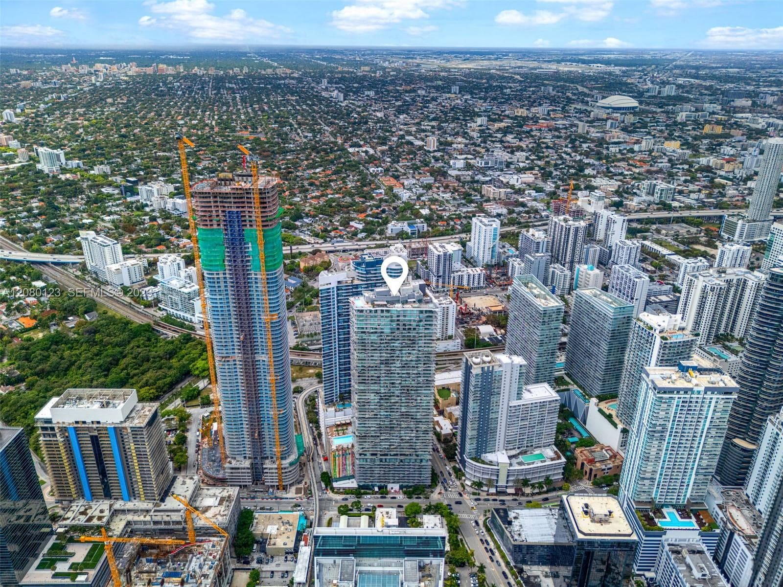 Aerial perspective showing Brickell, the Port of Miami, and Biscayne Bay - the panoramic outlook from PH-5209.