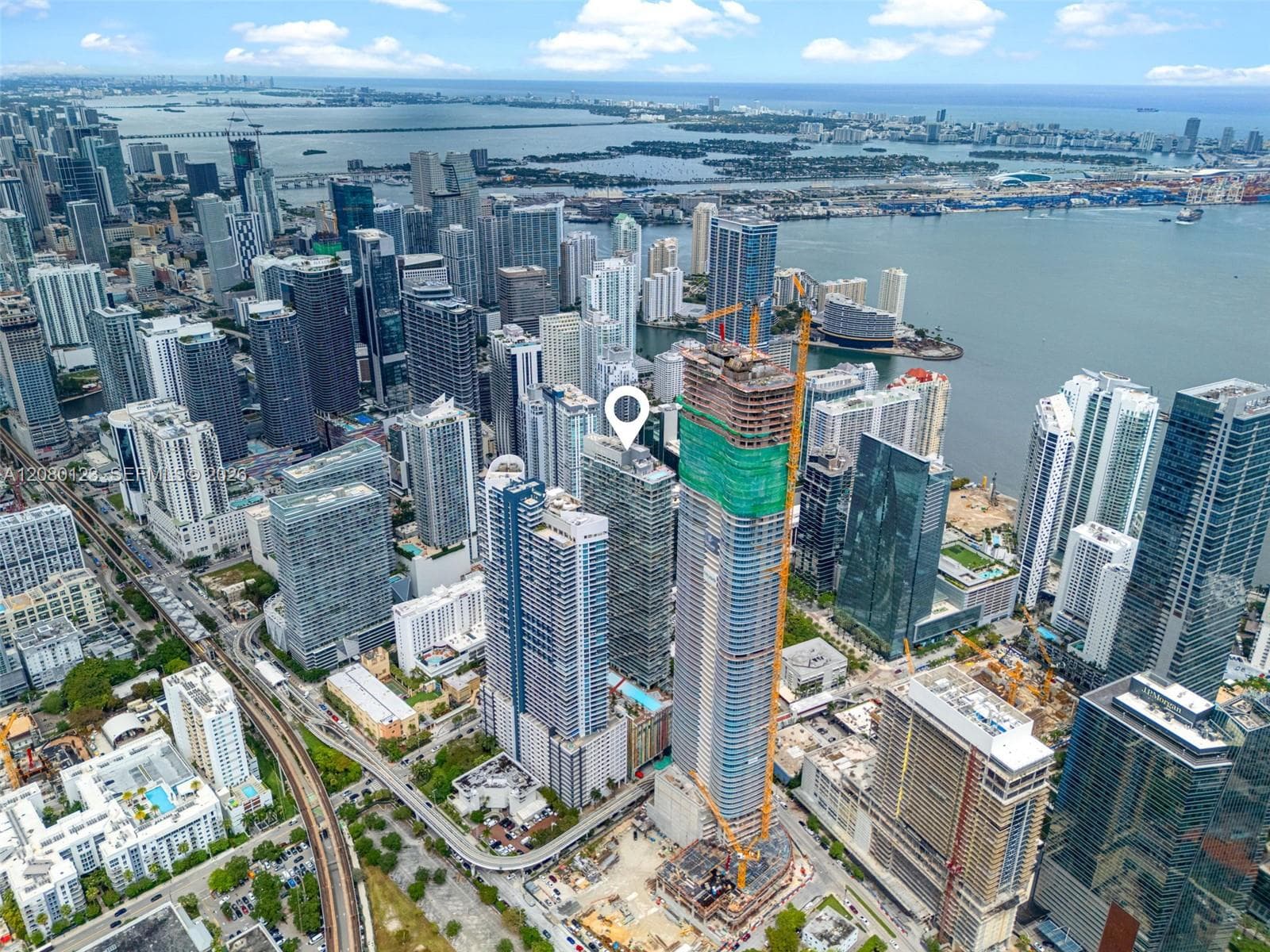 Aerial view of Brickell with downtown Miami and the Atlantic Ocean in the distance.