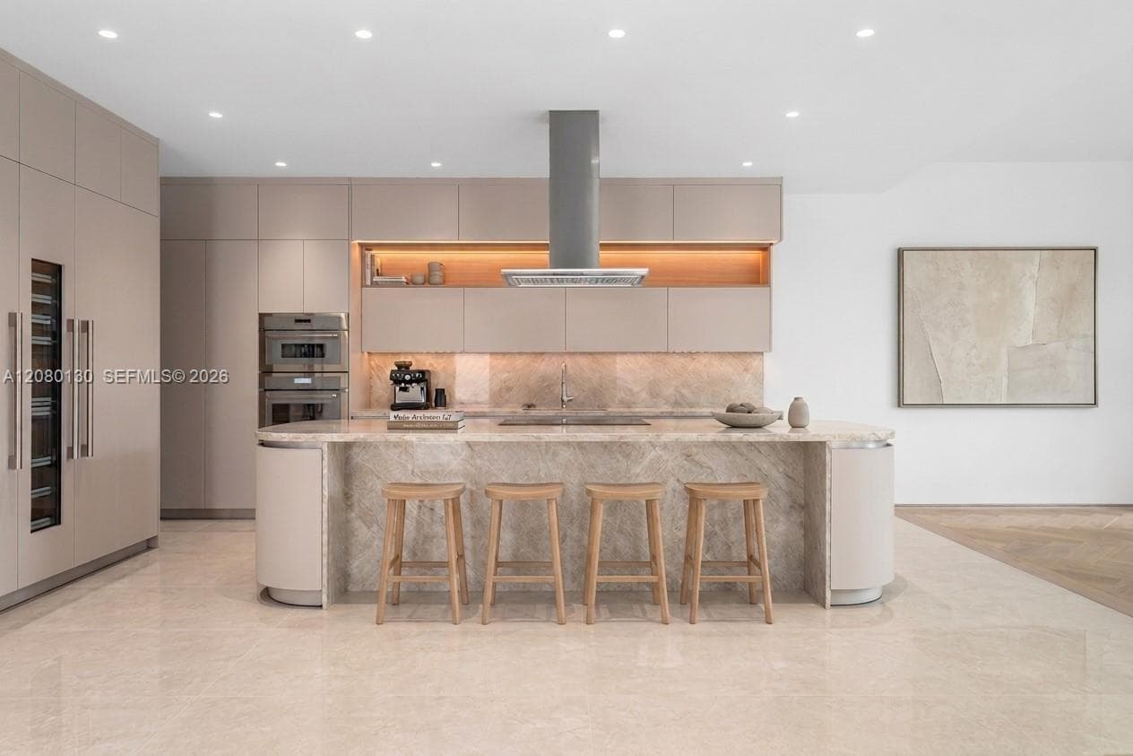 Kitchen. Disclaimer: Several photographs presented in this listing contain digitally added furniture, artwork, and decor. These virtually staged images are intended solely for illustrative purposes.