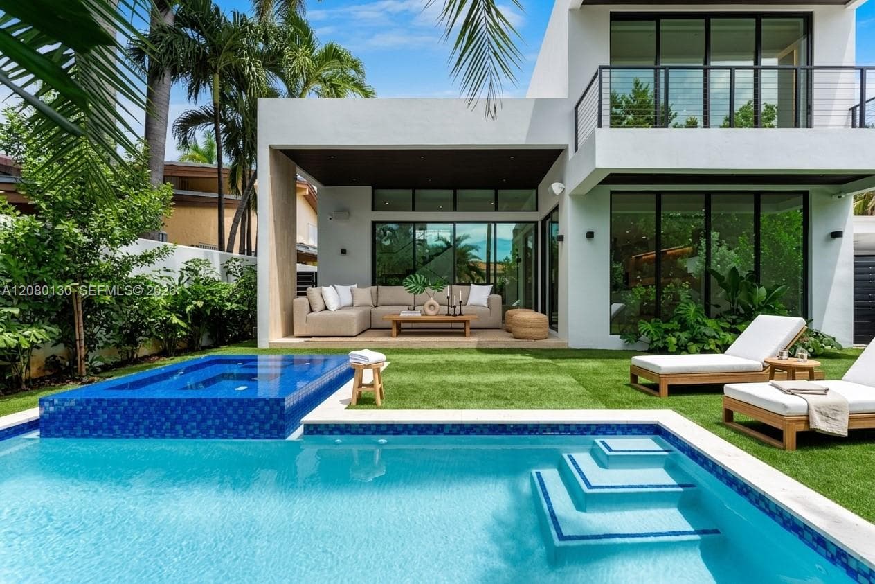 Back Yard. Disclaimer: Several photographs presented in this listing contain digitally added furniture, artwork, and decor. These virtually staged images are intended solely for illustrative purposes.