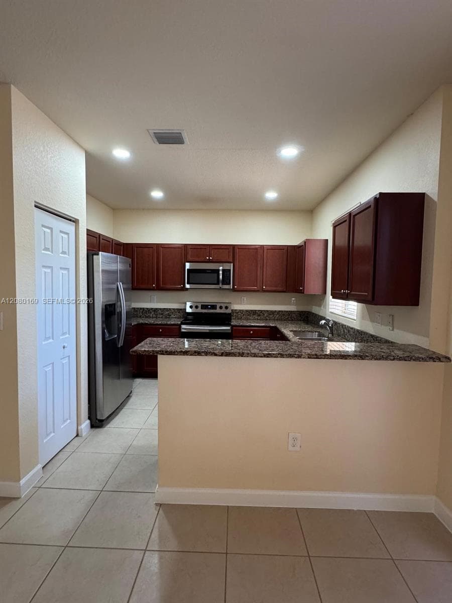 14720 SW 25th Ln #14720 photo 3