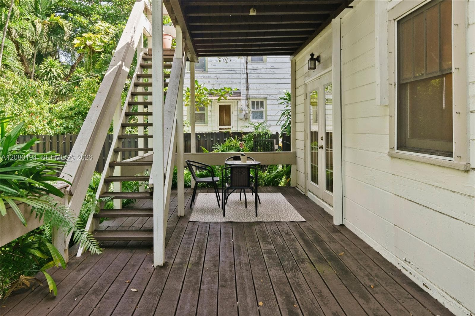 Enjoy Patio surrounded by Lush Landscaping