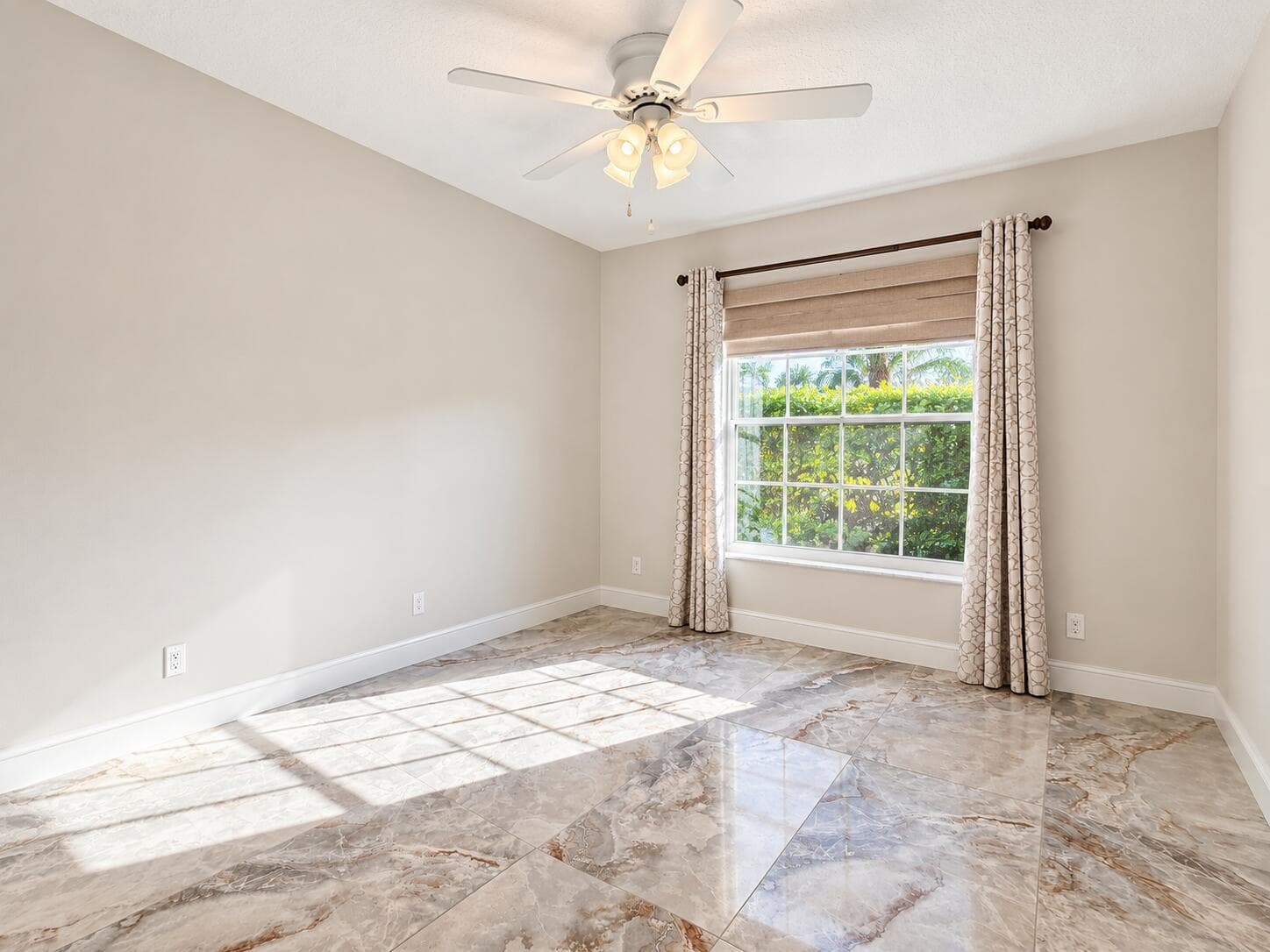 Bright Empty Room with Marble Floors and