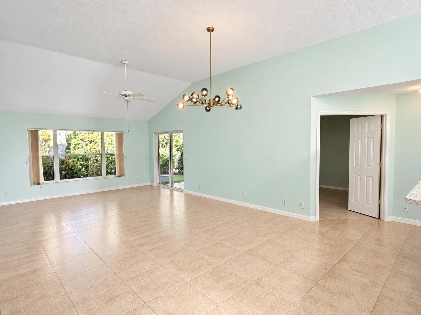 Airy Mint Living Room with Warm Tile