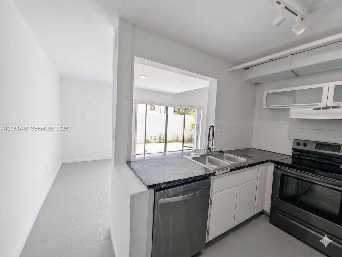 1311 SW 124th Ct #17-E photo 5