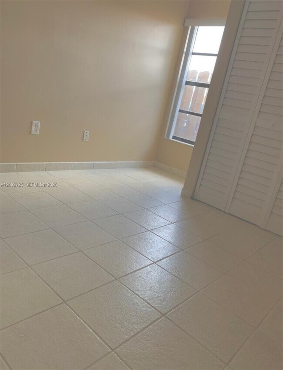 2 of 2: Photographs depicting the third bedroom.