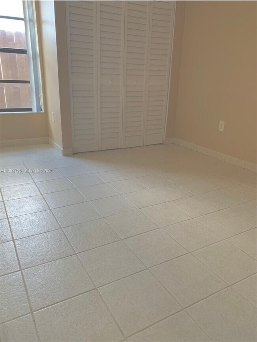 1 of 2: Photographs depicting the third bedroom.