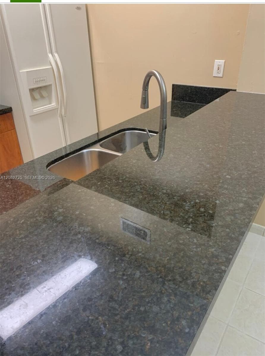 1 of 4: Image depicting the Kitchen and Snack Counter Area.