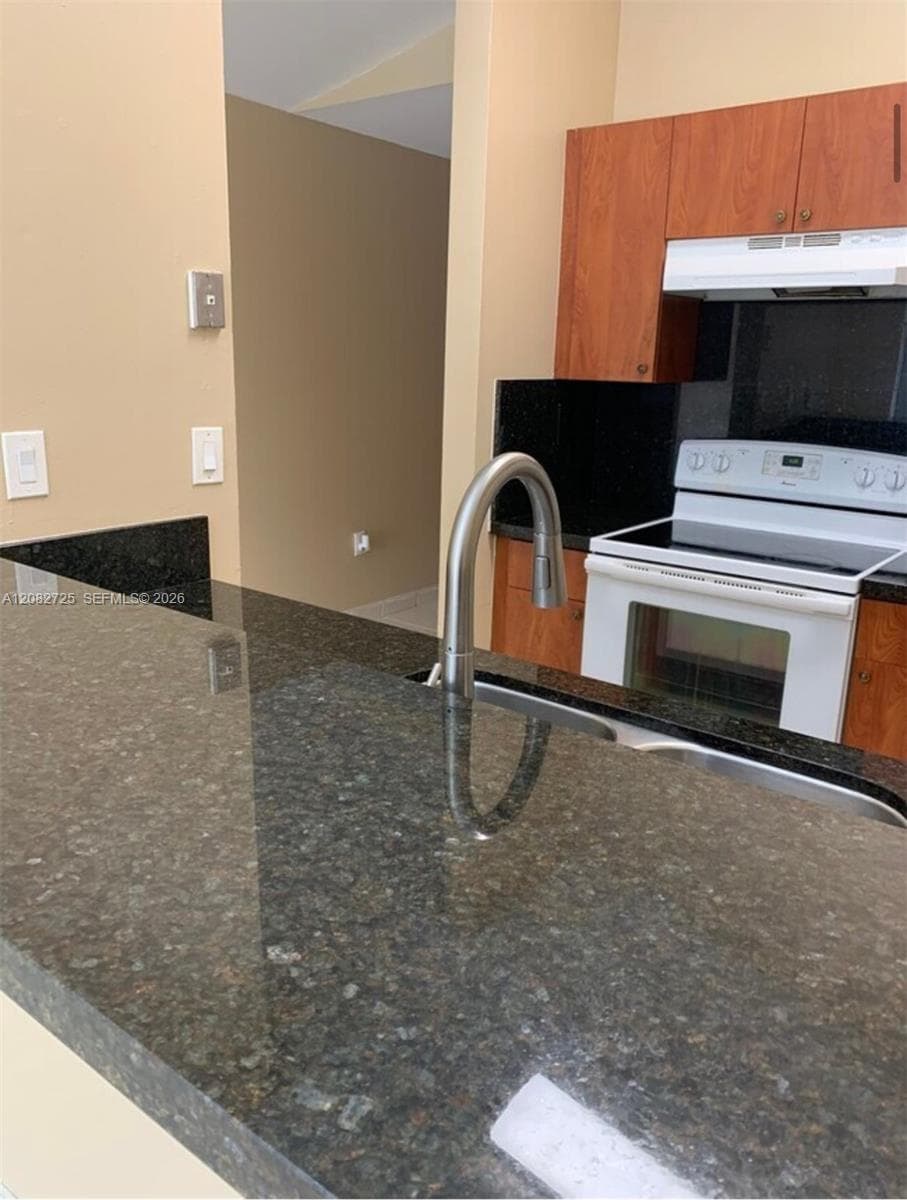 2 of 4: Image depicting the Kitchen and Snack Counter Area.