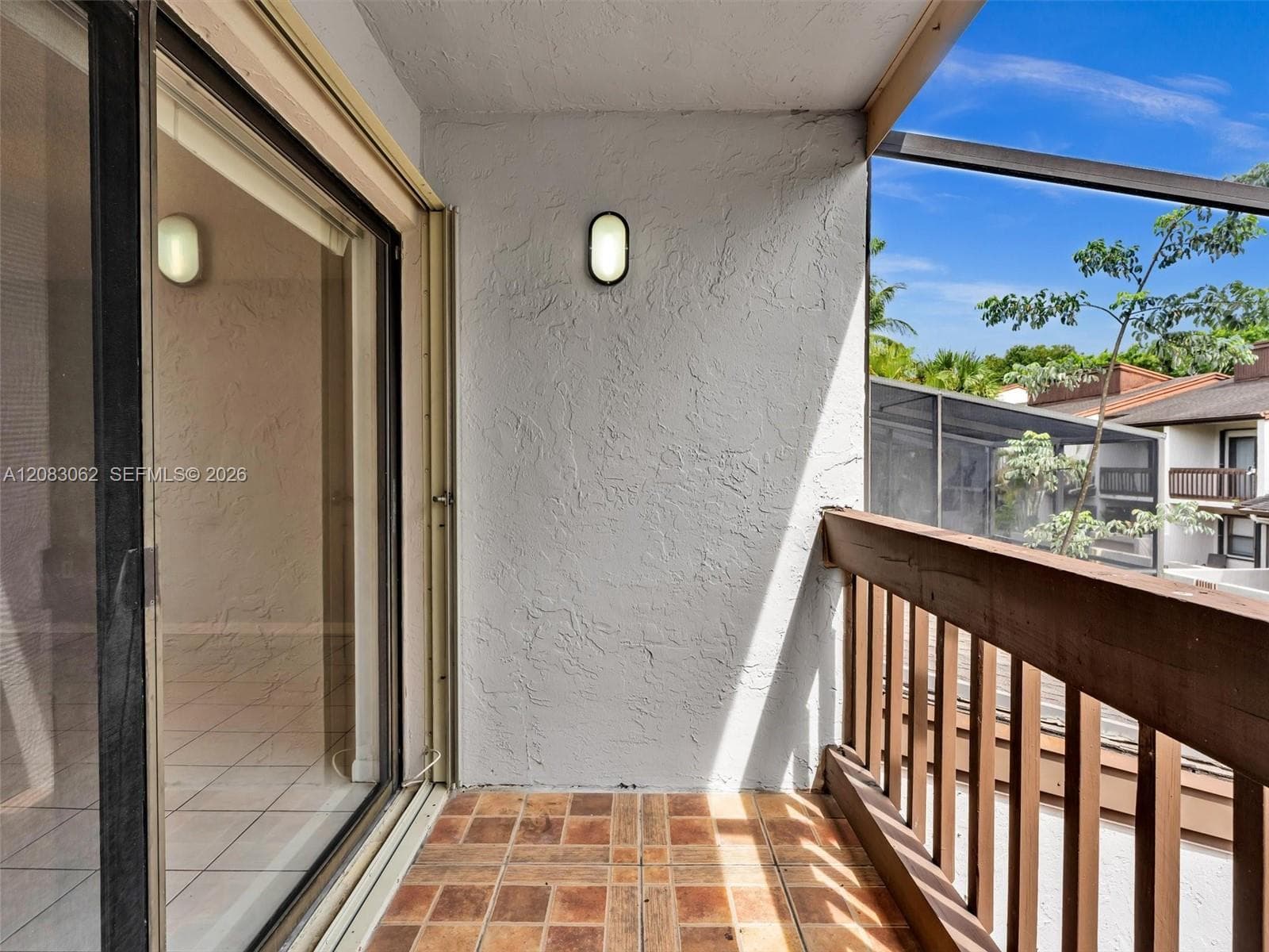 Primary Bedroom with full bathroom, balcony and walk in closet.