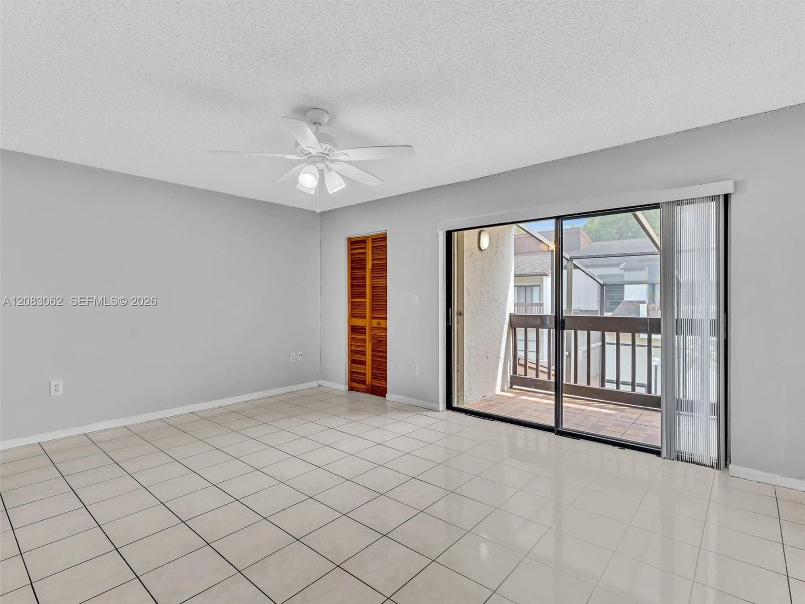 Primary Bedroom with full bathroom, balcony and walk in closet.
