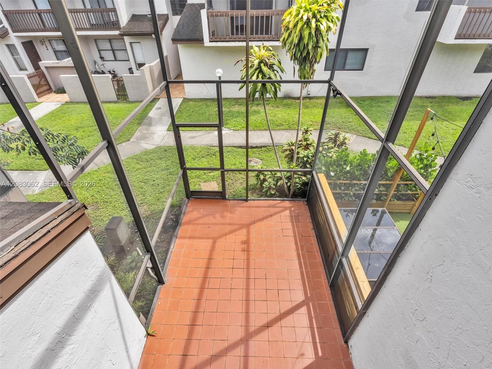 Primary Bedroom with full bathroom, balcony and walk in closet.