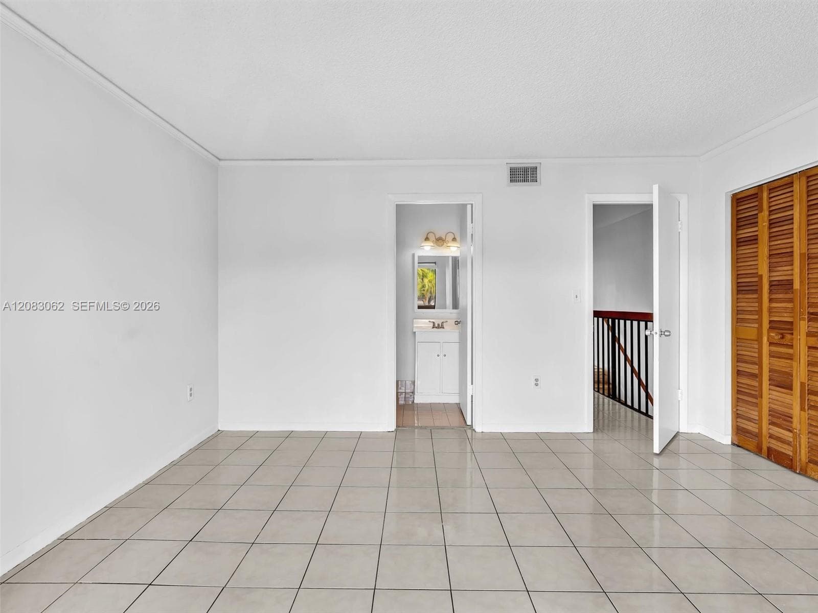 2nd Primary Bedroom with balcony, and full bath.