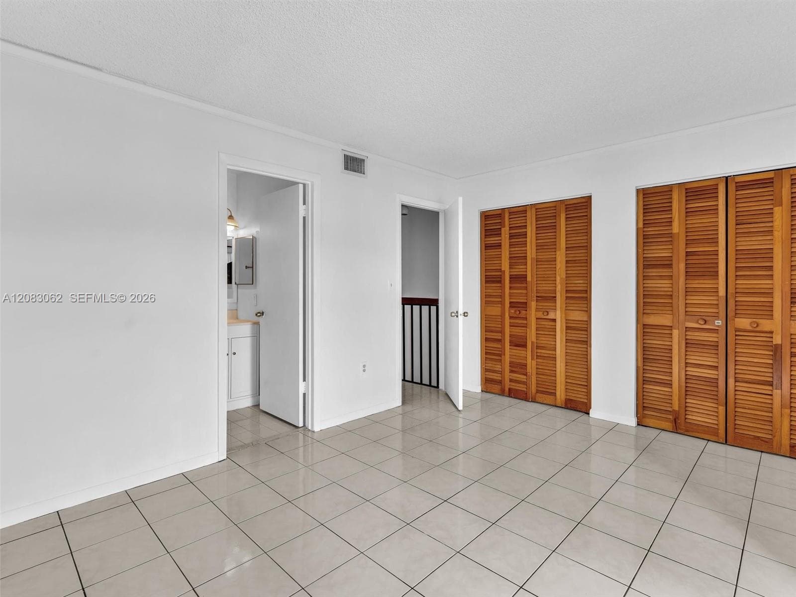 2nd Primary Bedroom with balcony, and full bath.