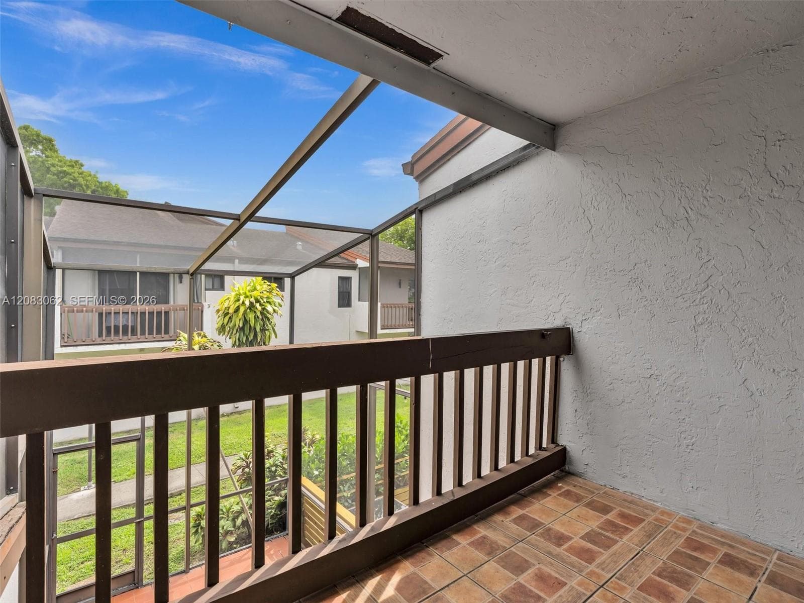 Primary Bedroom with full bathroom, balcony and walk in closet.
