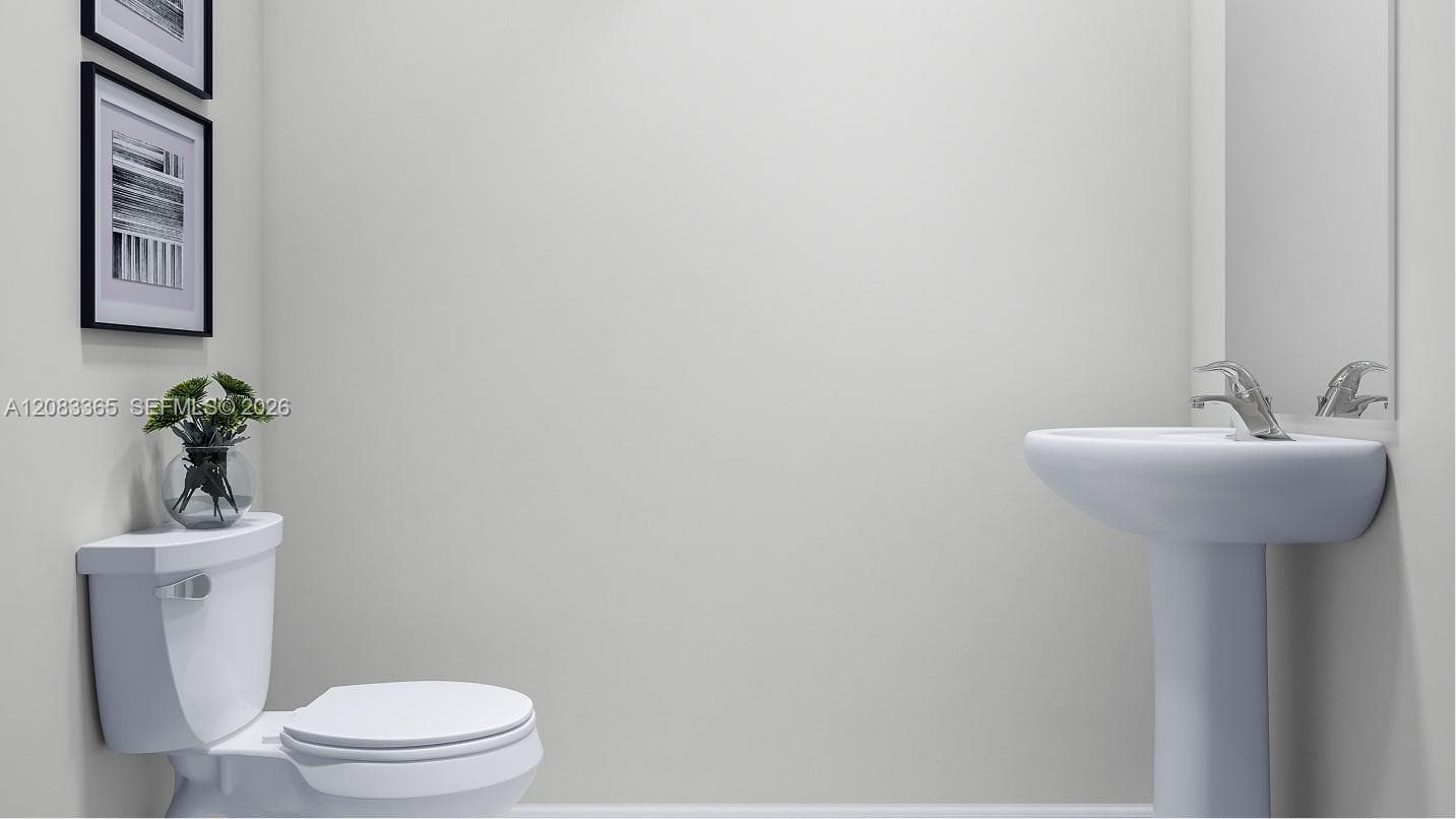 Located behind the family room is a convenient powder room to readily meet the needs of the whole household and visiting guests alike.