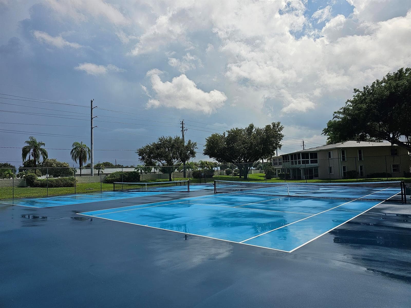 Newly Refinished Tennis Courts Located S