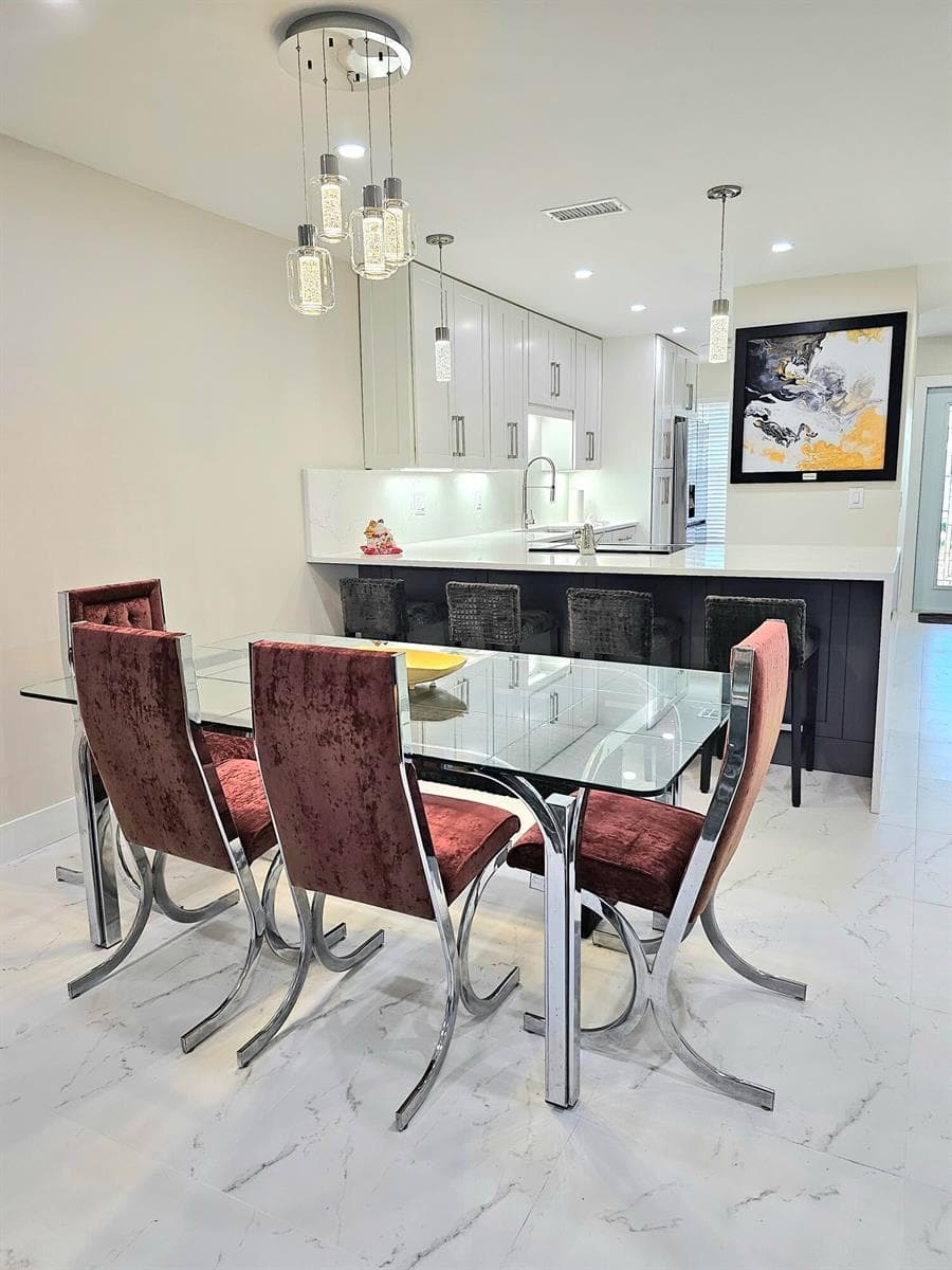 Dining Room with Designer Lighting